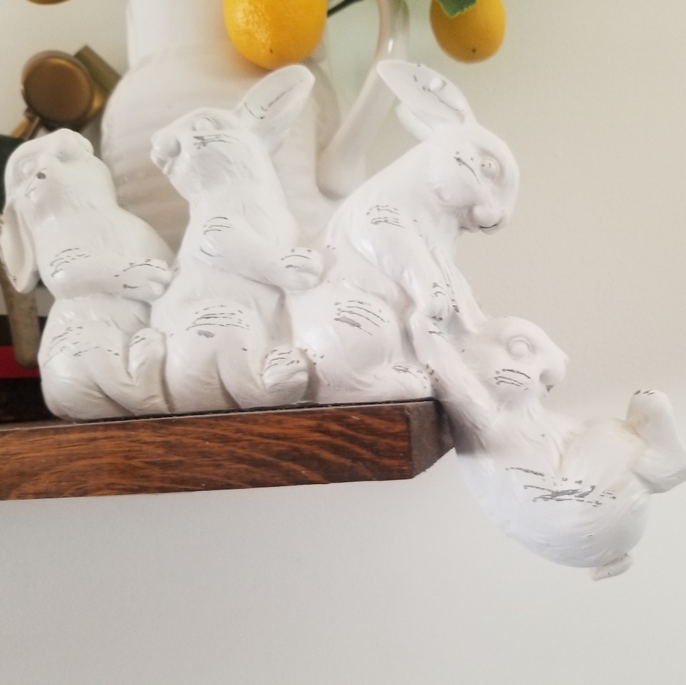 Distressed white ceramic bunnies